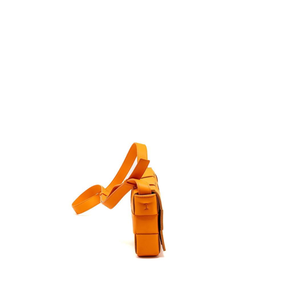 BOTTEGA VENETA SMALL CASSETTE BAG LAMBSKIN ORANGE GHW