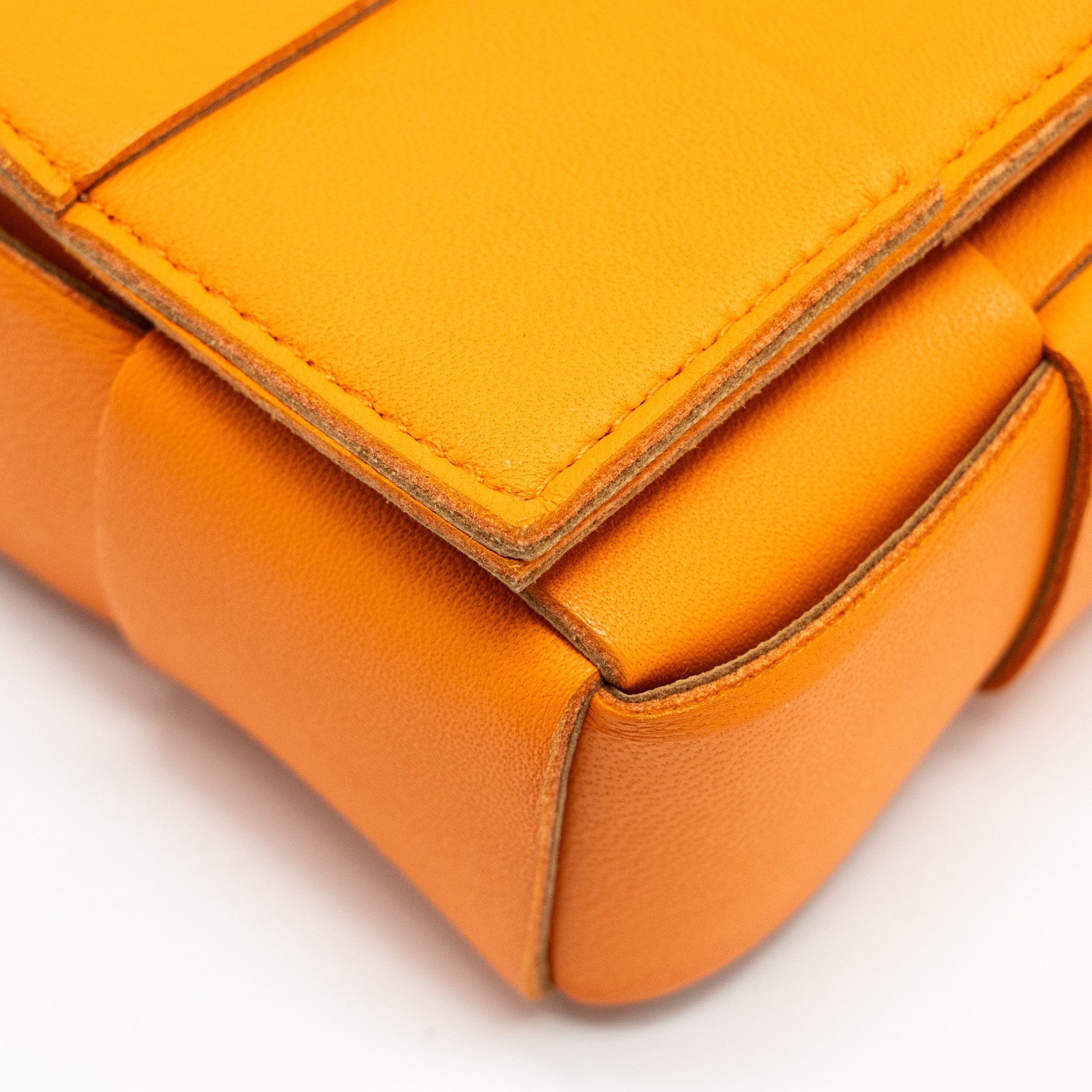 BOTTEGA VENETA SMALL CASSETTE BAG LAMBSKIN ORANGE GHW