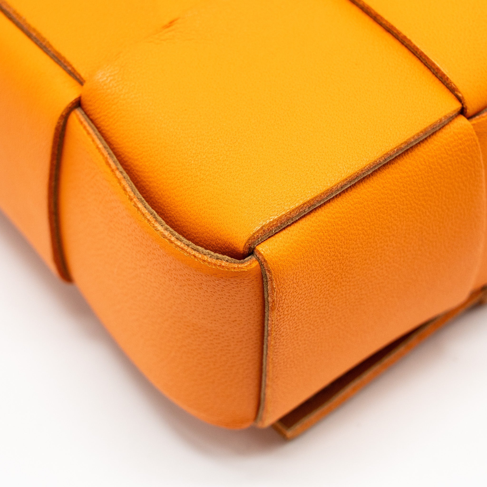 BOTTEGA VENETA SMALL CASSETTE BAG LAMBSKIN ORANGE GHW