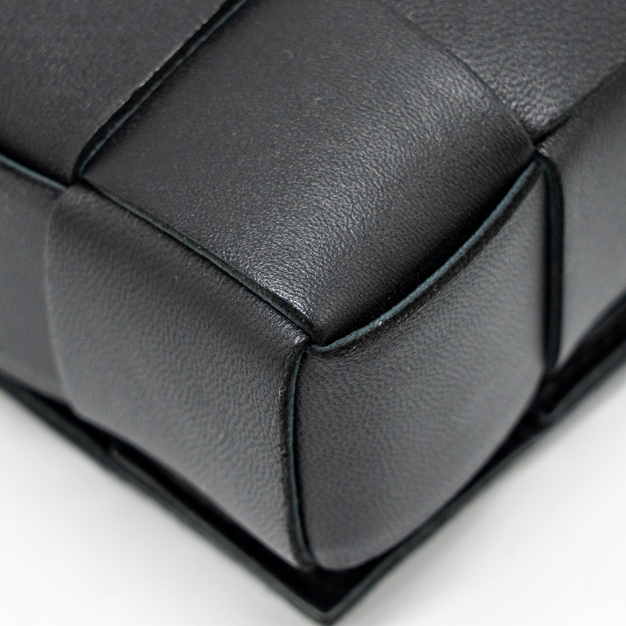 BOTTEGA VENETA SMALL CASSETTE BAG LAMBSKIN BLACK GHW