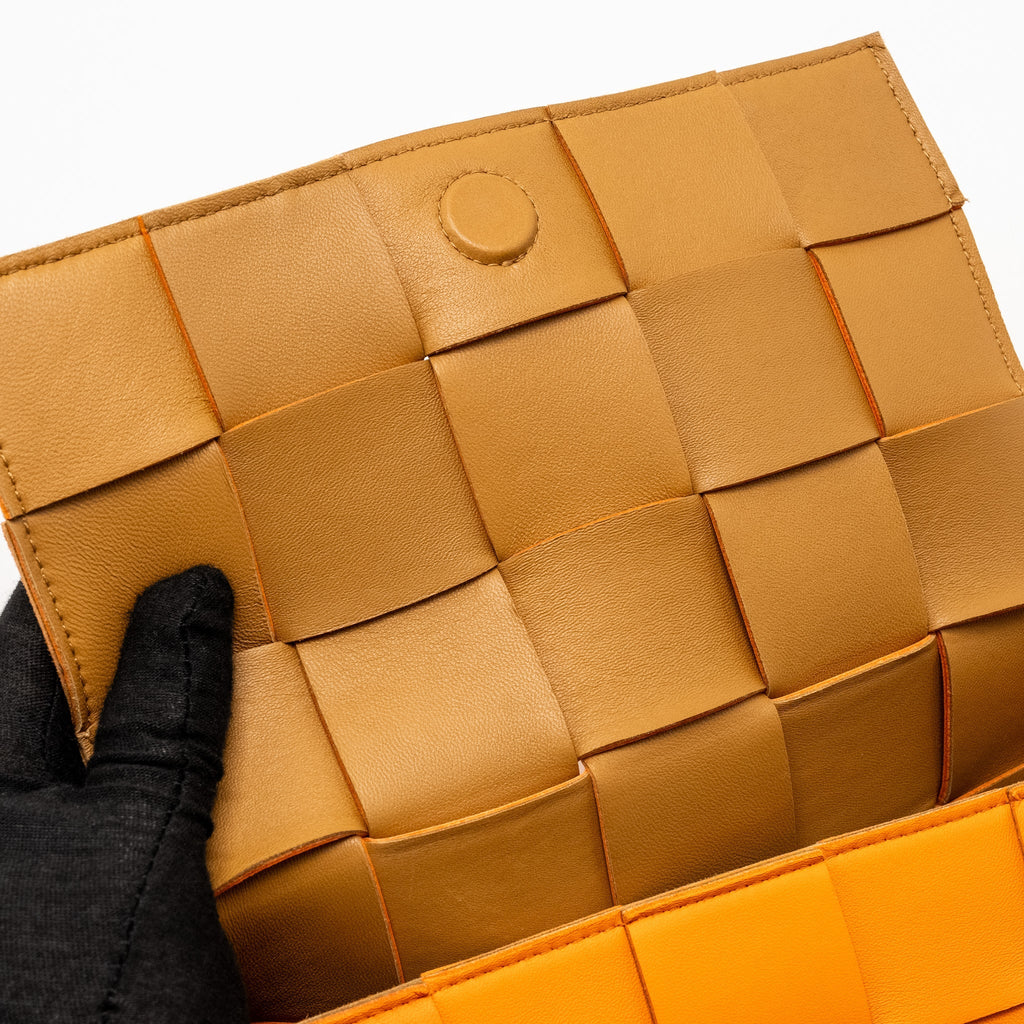 BOTTEGA VENETA SMALL CASSETTE BAG LAMBSKIN ORANGE GHW