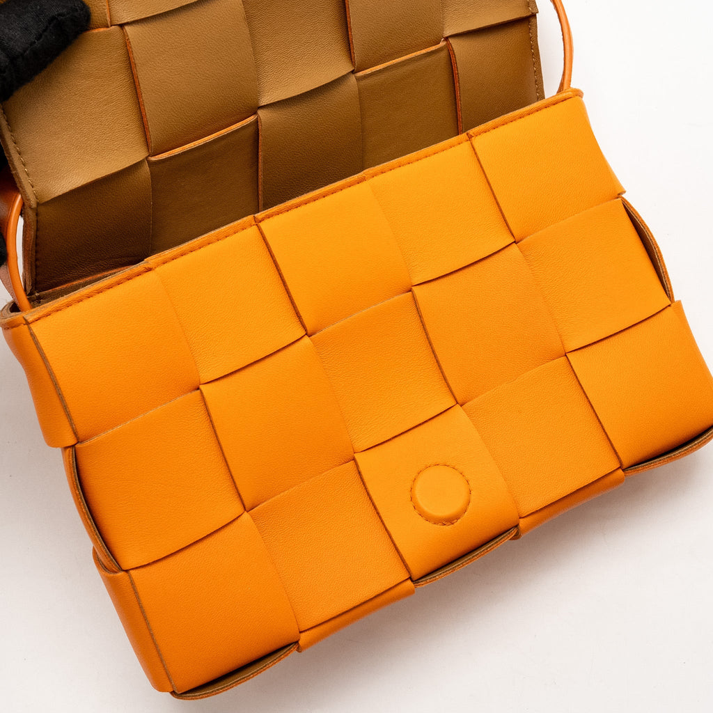 BOTTEGA VENETA SMALL CASSETTE BAG LAMBSKIN ORANGE GHW
