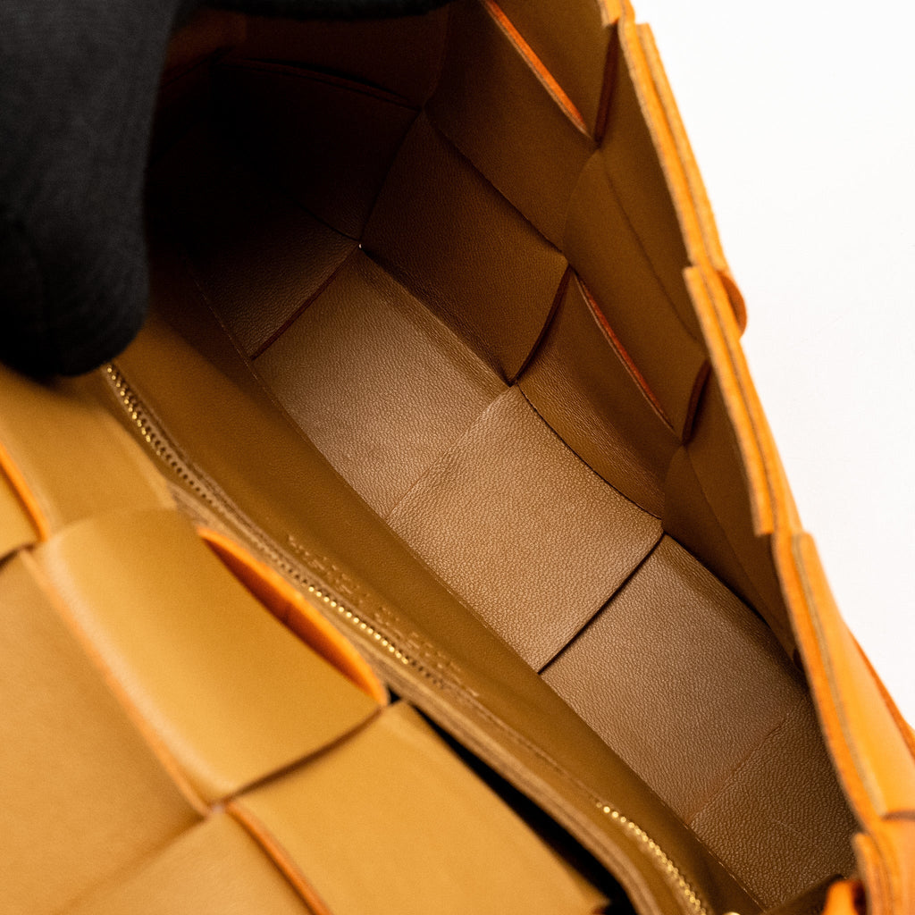 BOTTEGA VENETA SMALL CASSETTE BAG LAMBSKIN ORANGE GHW