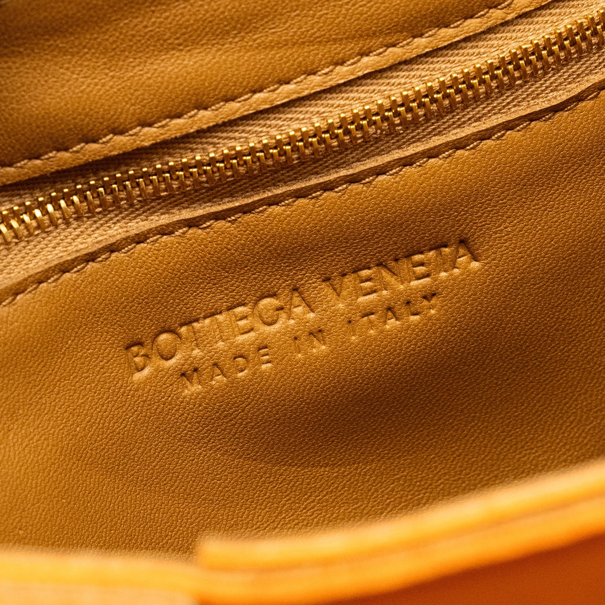 BOTTEGA VENETA SMALL CASSETTE BAG LAMBSKIN ORANGE GHW
